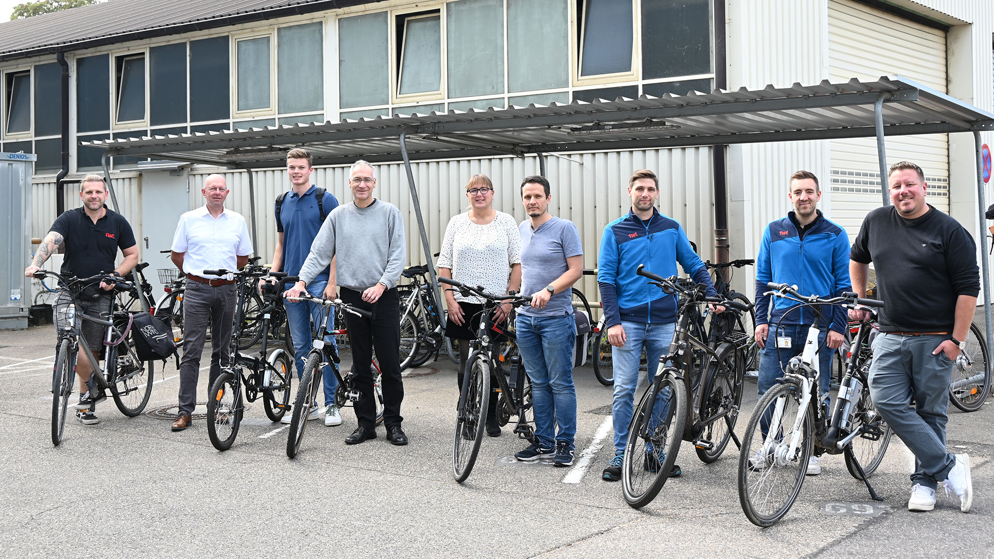 TWL Mitarbeitern mit Fahrrädern